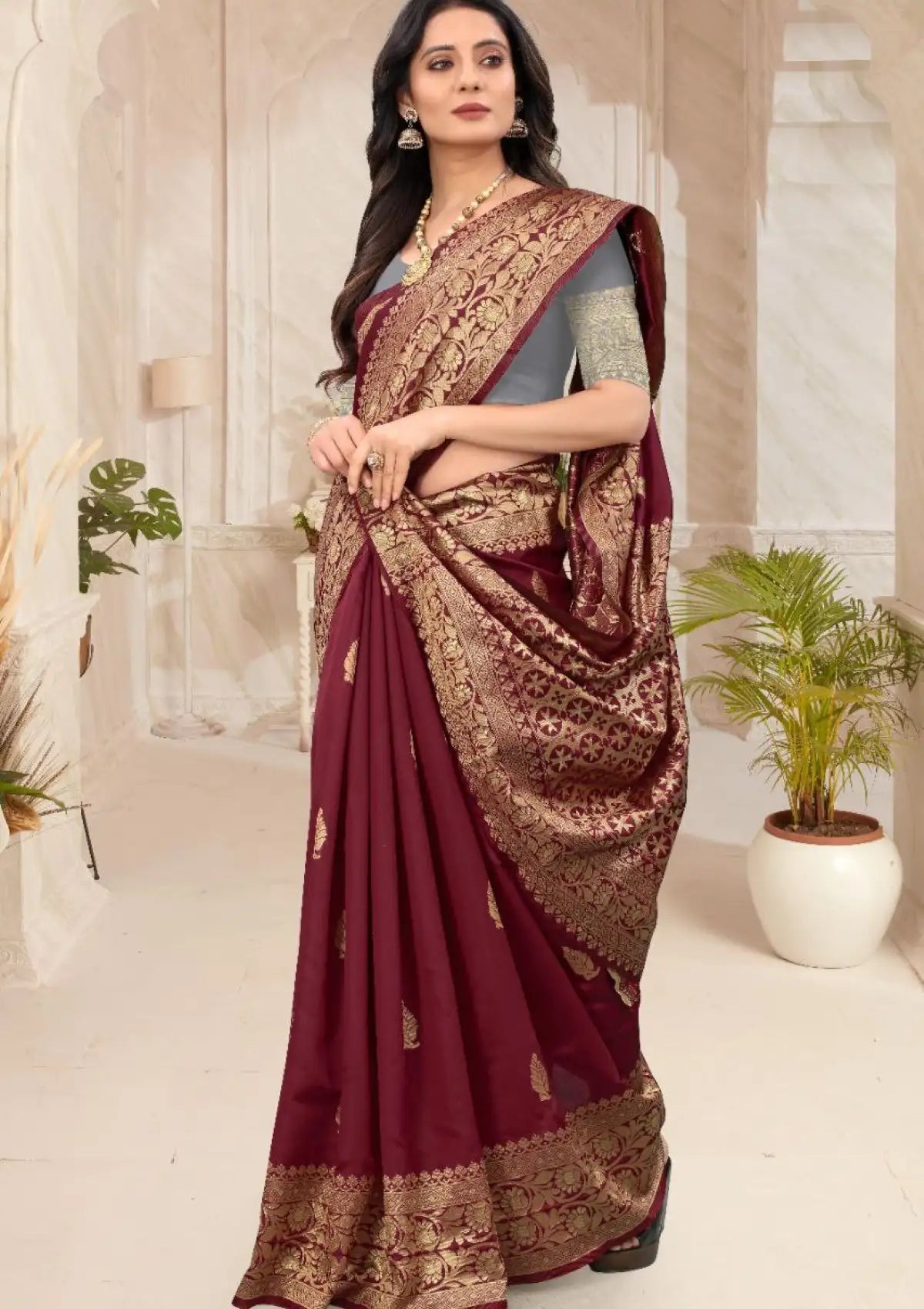 Maroon Ethnic Motifs Zari Silk Blend Saree