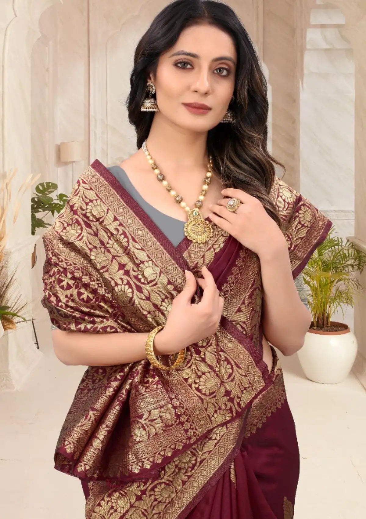 Maroon Ethnic Motifs Zari Silk Blend Saree