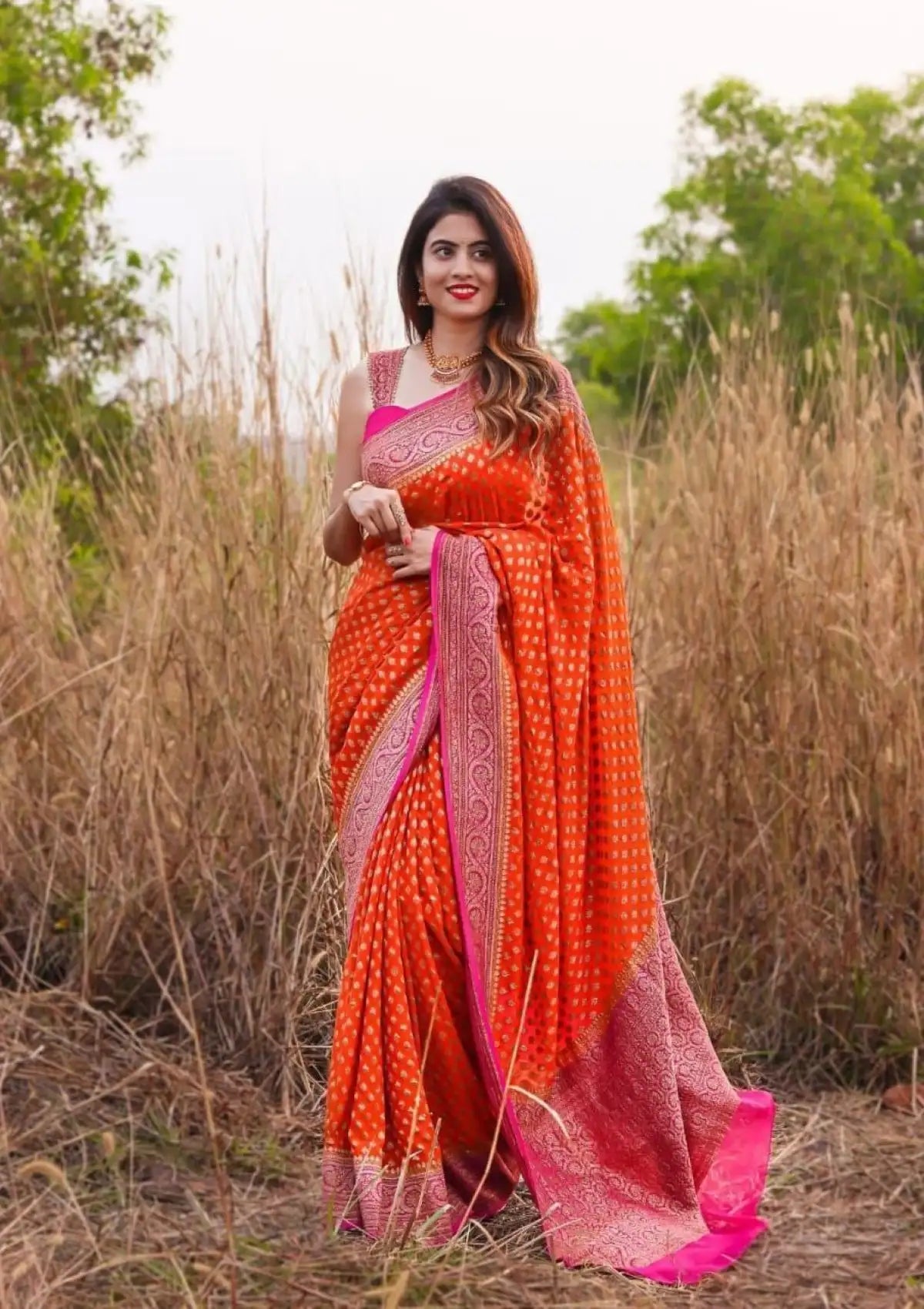 Orange Butti with Gold Saree