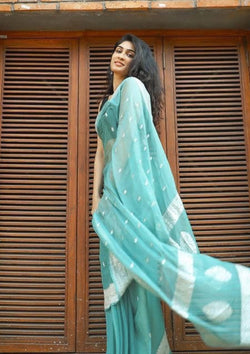Mint Green Linen saree with Silver Weaving