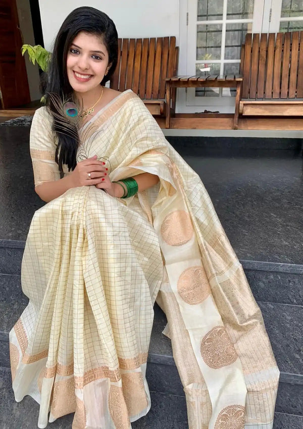 White Linen saree with Gold zari weaving