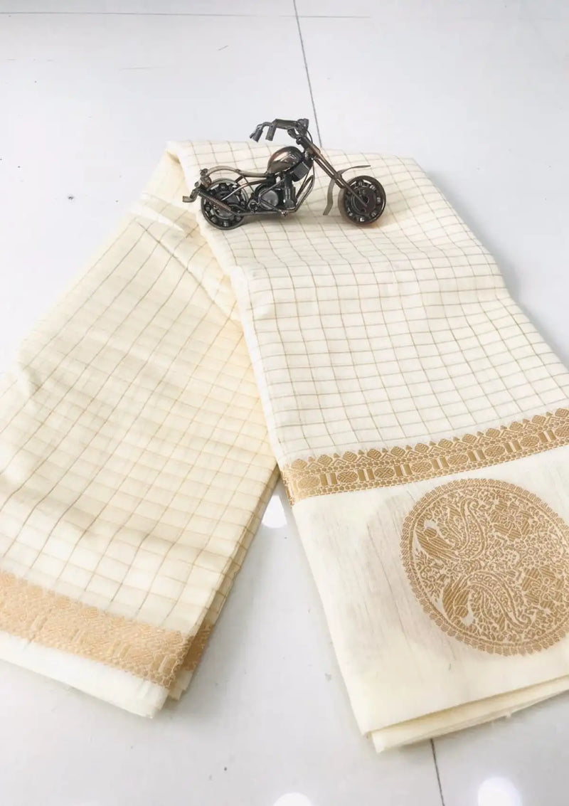 White Linen saree with Gold zari weaving